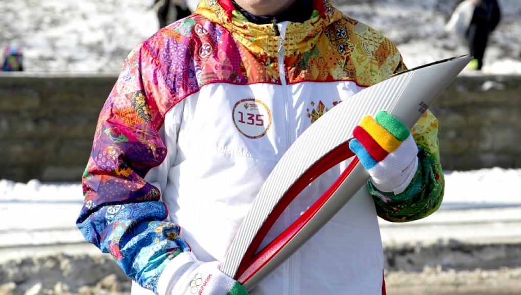 Torch with the Olympic flame in our hands!