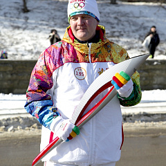 Torch with the Olympic flame in our hands!