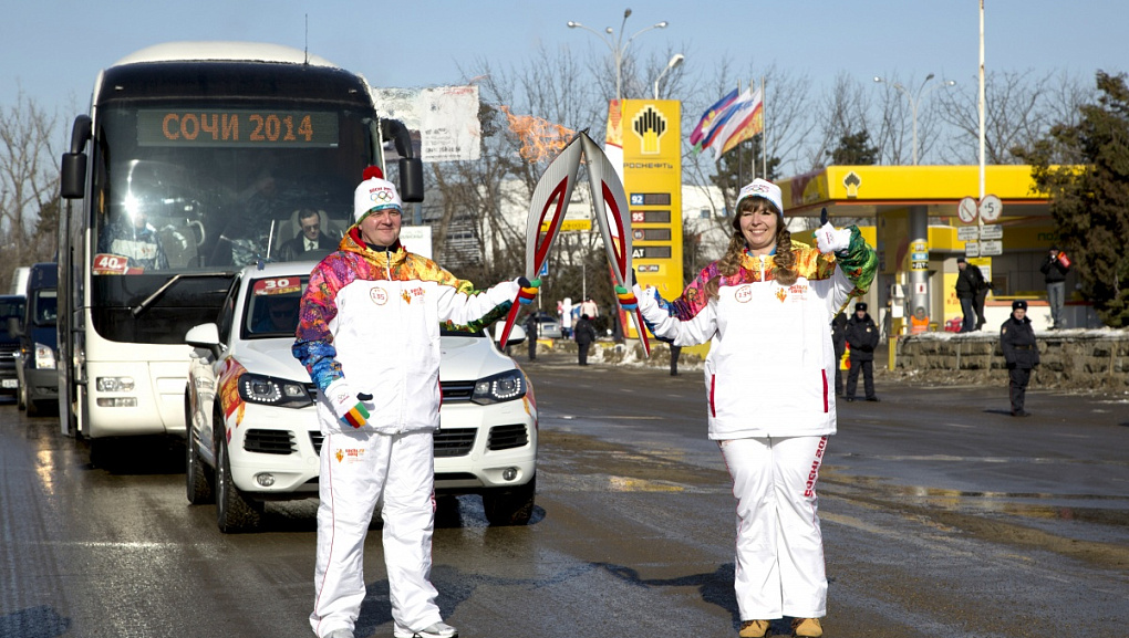 Torch with the Olympic flame in our hands!