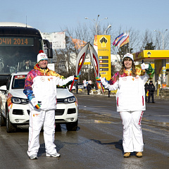 Torch with the Olympic flame in our hands!