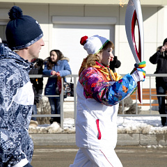 Torch with the Olympic flame in our hands!