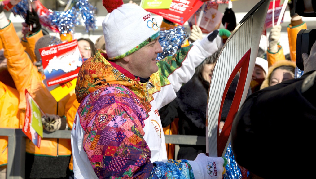 Torch with the Olympic flame in our hands!