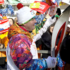 Torch with the Olympic flame in our hands!