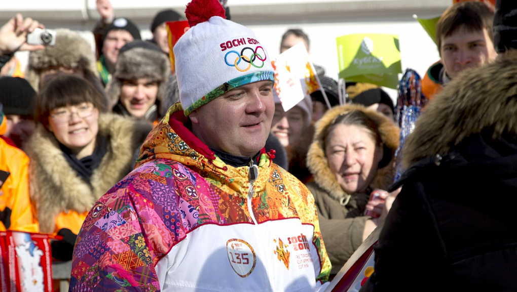 Torch with the Olympic flame in our hands!