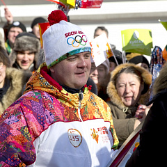Torch with the Olympic flame in our hands!